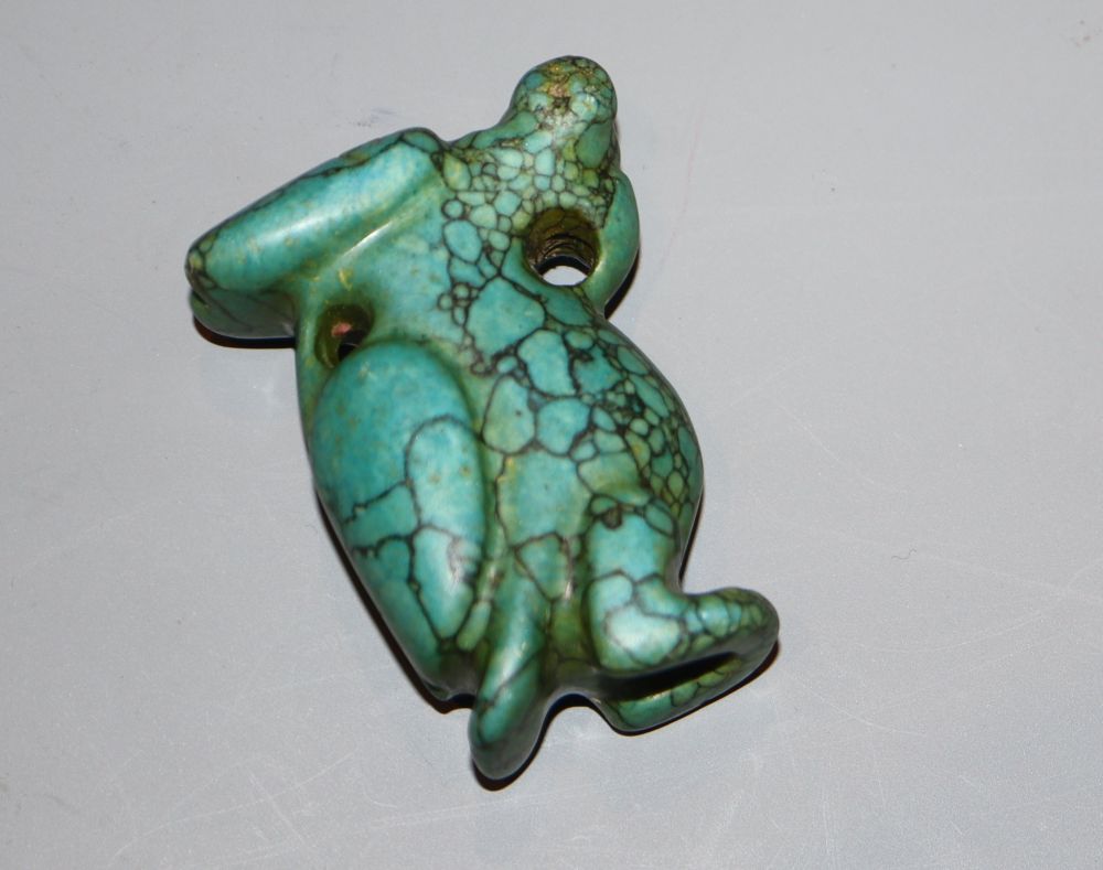A carved turquoise matrix amulet, possibly Ancient Egyptian?, 5.7cm